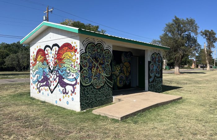 Colorful mural on park restroom building at Elmore Park.